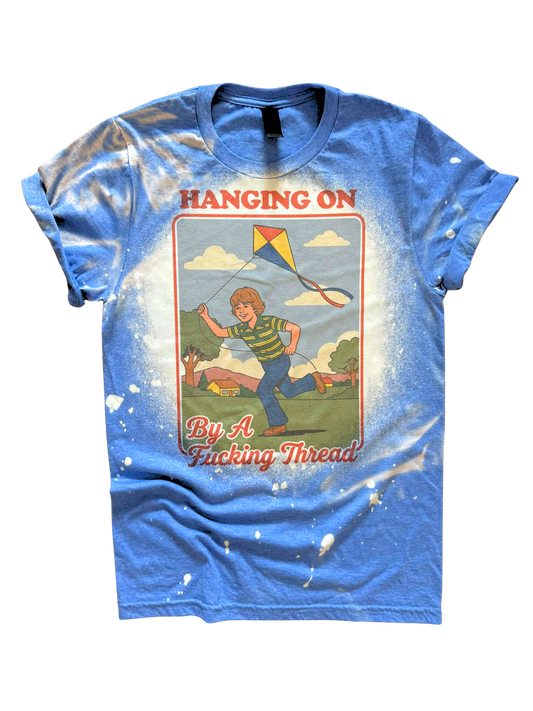 Hanging On By A F*cking Thread - Bleached Tee 🪁💀