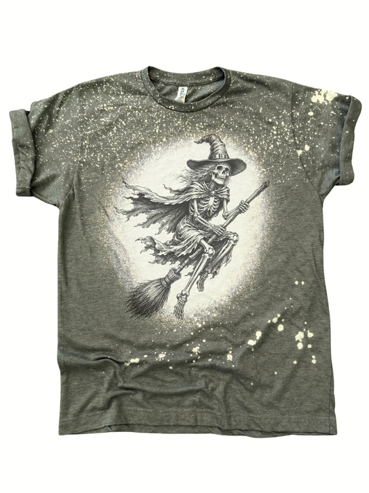Vintage Flying Skeleton Witch on Broomstick Gothic Halloween Graphic Tee